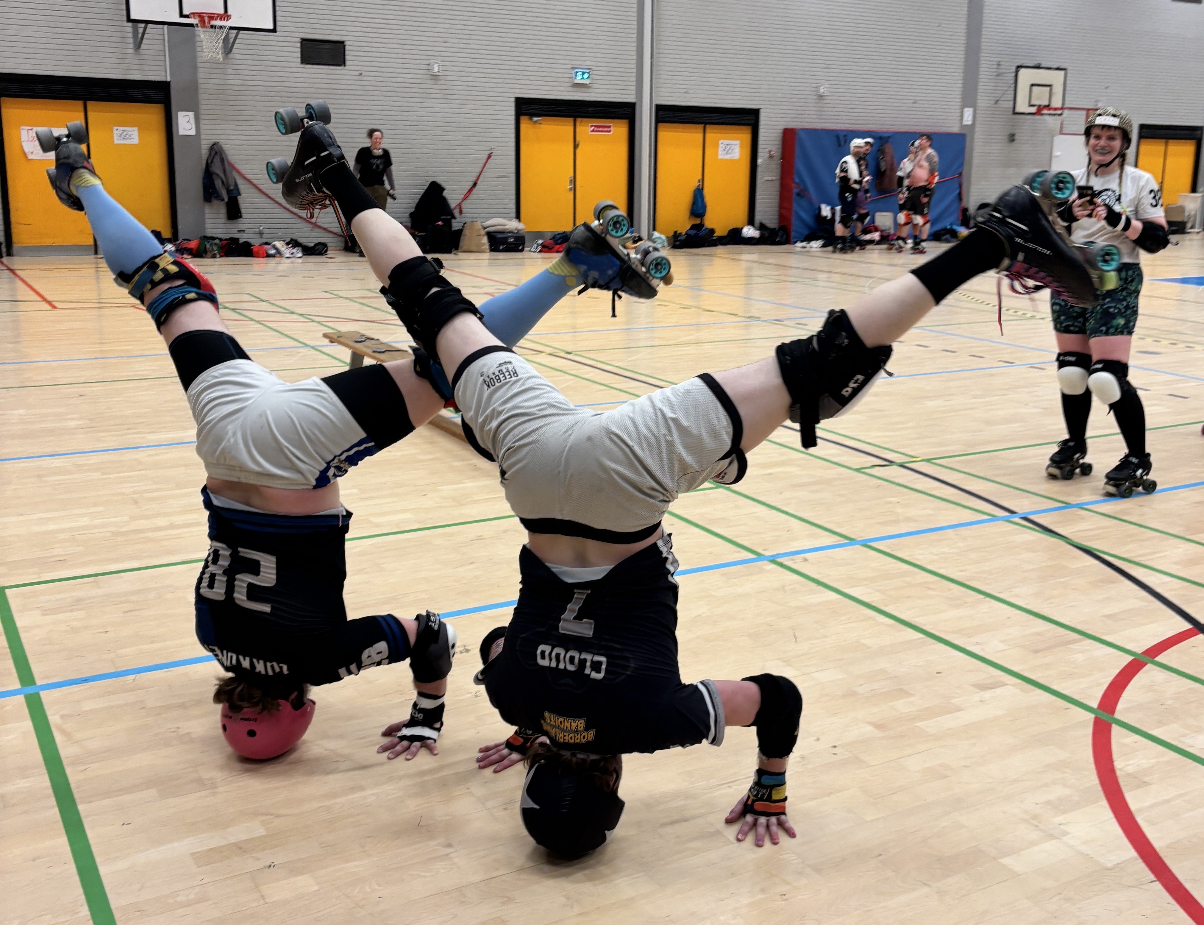 Two skaters upside down